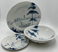 Isis blue and white pottery, with lakeside landscape decoration, charger, fruit bowl and plate (3)