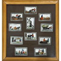 Framed set of eleven hand coloured French playing cards, each 7.5 x 11cm, the frame interior 49 x