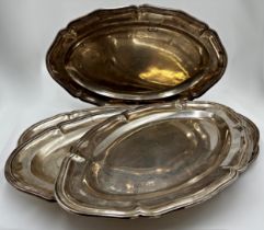 Two pairs of French silver plated platters with scalloped serpentine rims, the largest 60 x 33cm