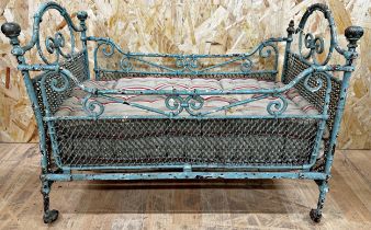 Great novelty 19th century dogs bed, wrought iron frame with original paint and mattress, 44cm H x