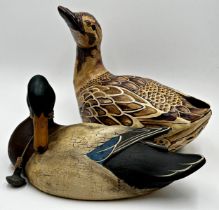 Folk art carved wooden decoy duck inscribed 'Big Sky Carvers' to base limited 6-8, 34cm long