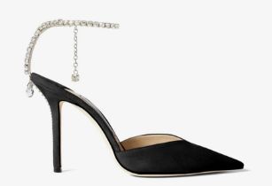 A pair of Jimmy Choo Saeda 100 crystal embellished black suede pumps. With hook-fastening ankle