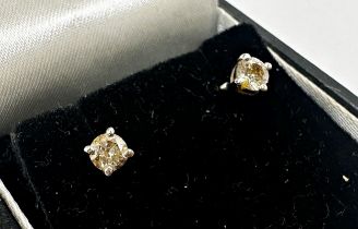 Pair of white gold diamond stud earrings, 0.25ct diamonds, 1g