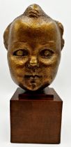 Dora Gordine (British, 1906-1991) - Baby head sculpture of Kirston Henderson, daughter to the