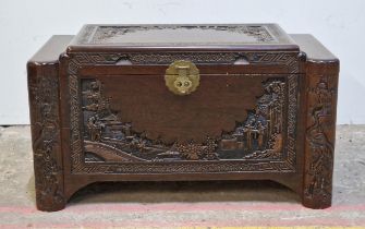 Oriental carved camphor wood blanket box with brass hinged lock, H 56cm x W 101cm x D 54cm