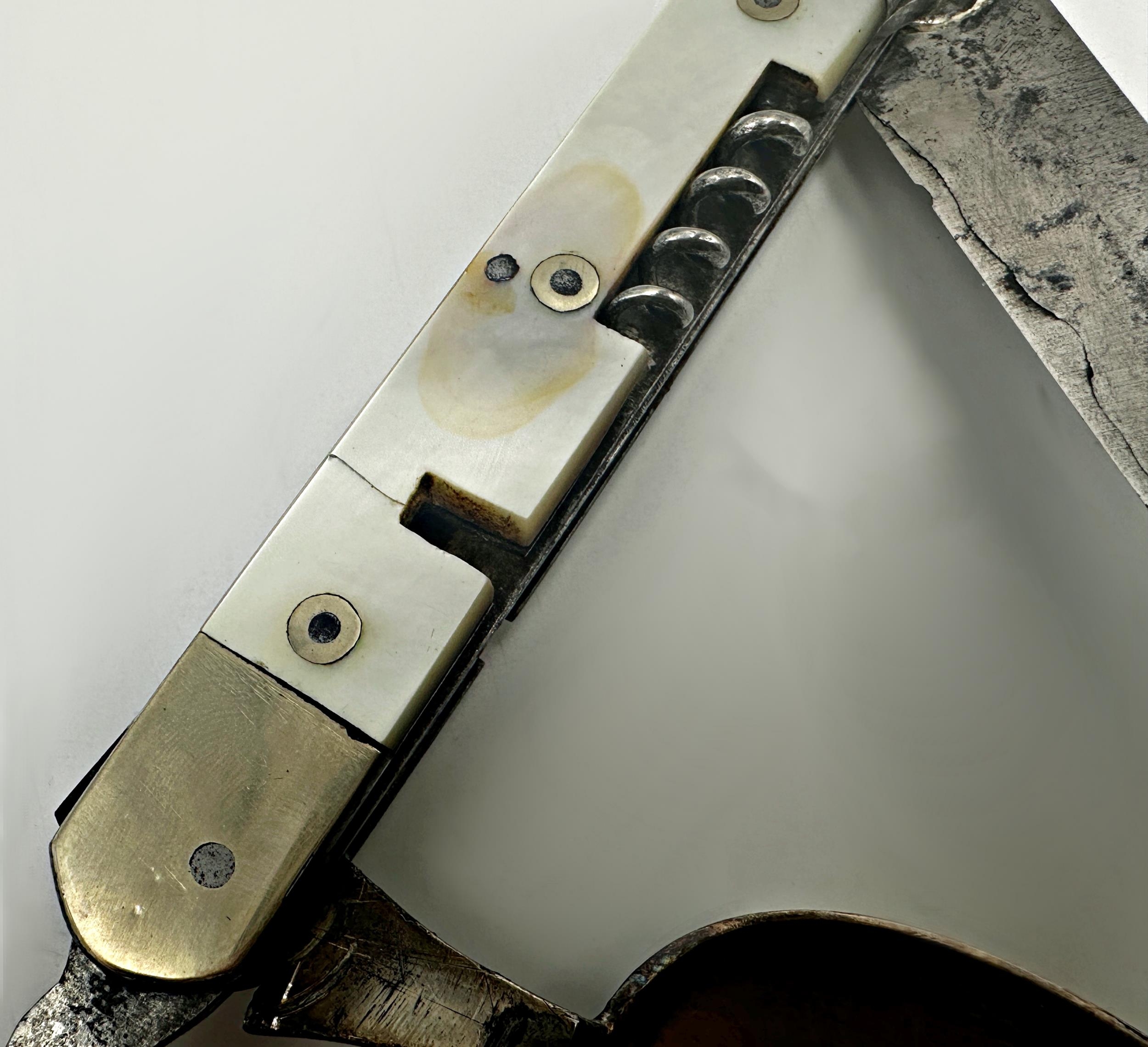 Turn of the century pearl and steel pocket knife comprising fork, spoon and corkscrew, 13cm long - Image 2 of 3