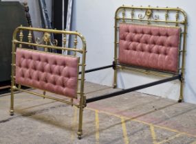 Victorian brass bedstead with iron side rails, cushioned head and footboard, studded edging,