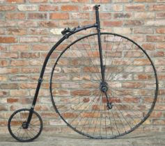 19th century iron framed penny farthing bicycle, with sprung seat, perfect wall art installation,