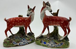 Early pair of Staffordshire pearlware deers, 18cm H x 14.5cm W (af)