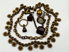 Four antique yellow metal and stone intaglio seals, to include a gentleman's cut in rock crystal,