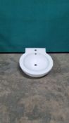 WHITE KEYHOLE SIT ON CERAMIC BASIN