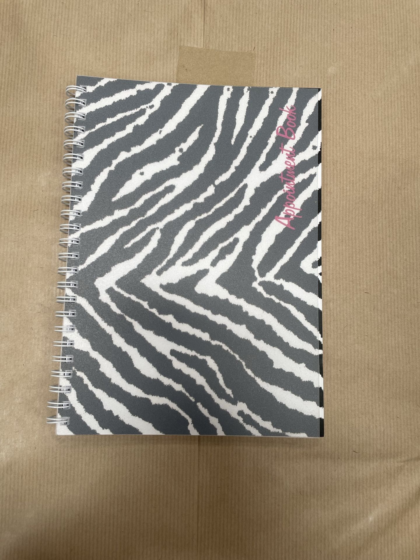 Approximately 260 x Freelance Zebra/Leopard Binded Appointment Books