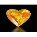 Saphir: sehr schöner und wertvoller, unbehandelter orange-gelber Saphir in Herzform von 7,29ct, gemm