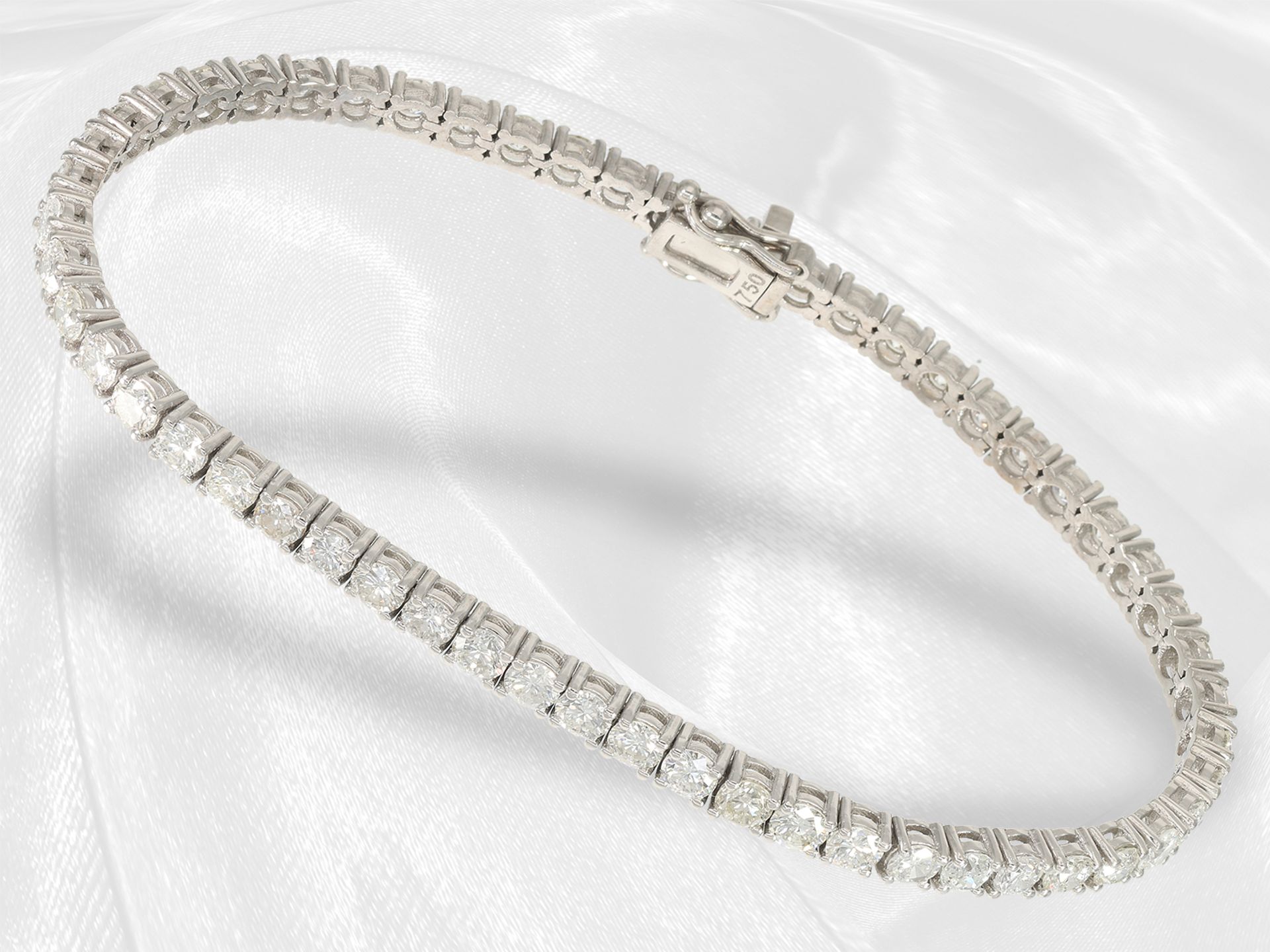 High quality handmade tennis bracelet with approx. 5.5ct brilliant-cut diamonds, 18K white gold