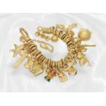 Interesting, heavy and unusual vintage charm bracelet with numerous pendants, 18K gold