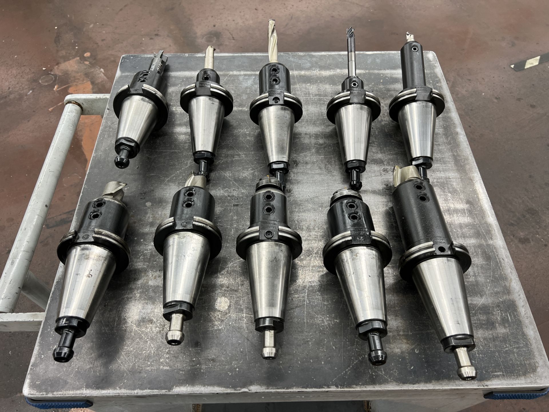 (10) Tecnara Side Lock CAT 50 Holders, Various Size Shanks with Various Tooling. Facemills,