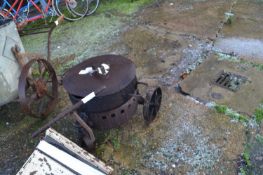 Vintage cast wheeled tar bucket