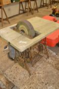 Vintage Singer sewing machine base adapted to carry a sharpening stone