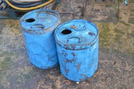 Two vintage oil drums