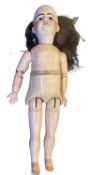 SFBJ bisque head doll. Blue eyes and brown hair. Marked to back of head Depose 9. Length
