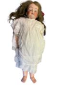 Catterfelder Puppenfabrick bisque head doll in cream dress. Blue eyes. Marked to back of head 264.
