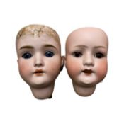 A pair of bisque dolls heads. - Heubach Koppelsdorf 302.3 - Gans and Seyfarth III