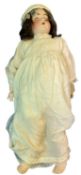 Alt, Beck and Gottschalk bisque head doll in cream gown. Marked to back of head 1367 4 1/2. Length