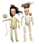 A pair of French bisque head dolls for restringing and repair. Both with blue eyes and brown hair,