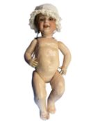 SFBJ bisque head doll . Black eyes and brown hair. Marked to back of head 236 Paris. Length