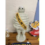 Large heavy duty cast iron Michelin Man statue, height approx 55cm