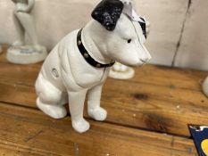 Cast iron money box formed as a dog, height approx 15cm