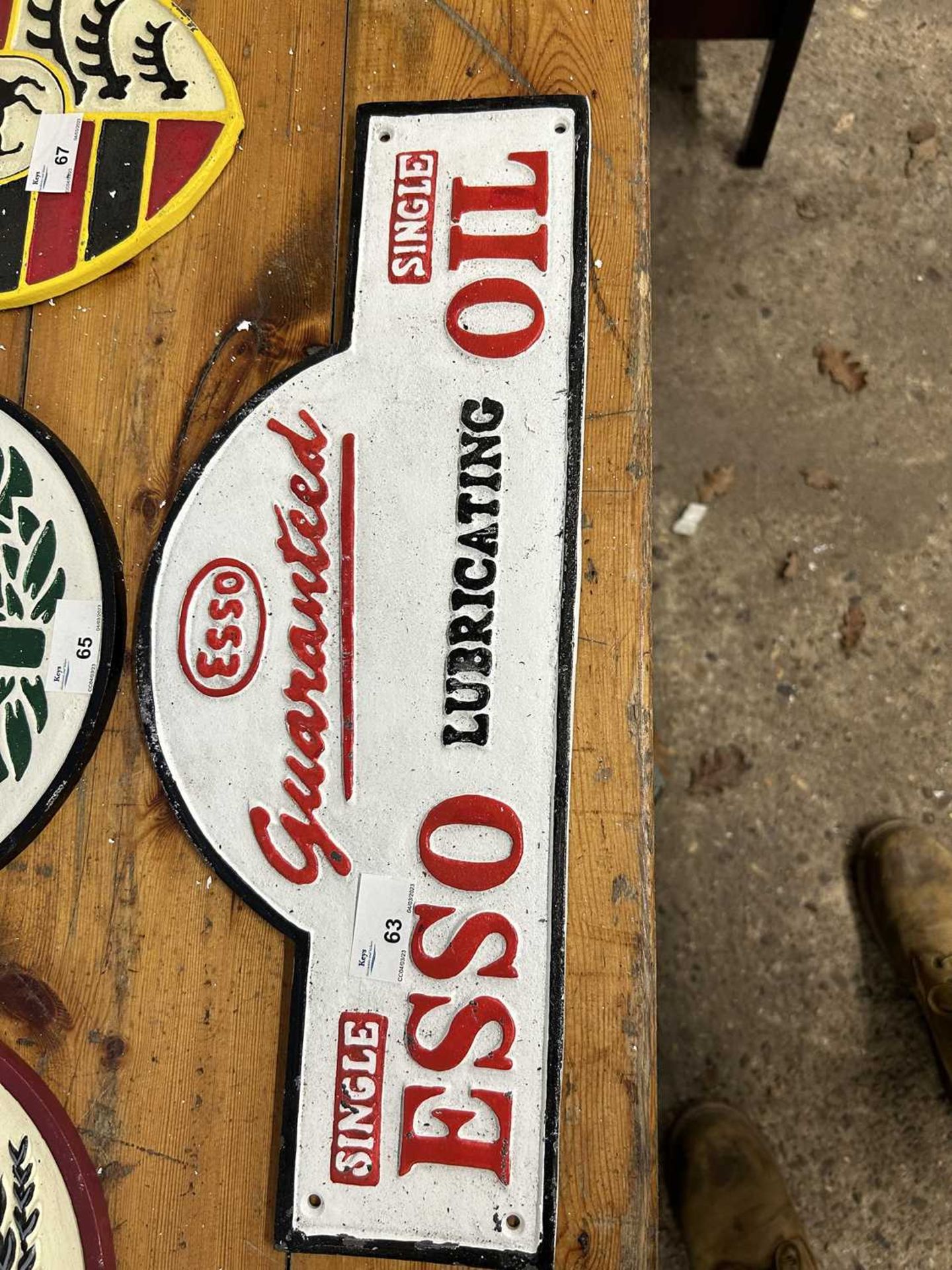 An Esso Oil cast advertising sign, width 46cm, height 18cm