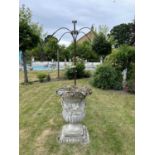 A large decorative composite garden urn, height approx 100cm, width approx 75cm