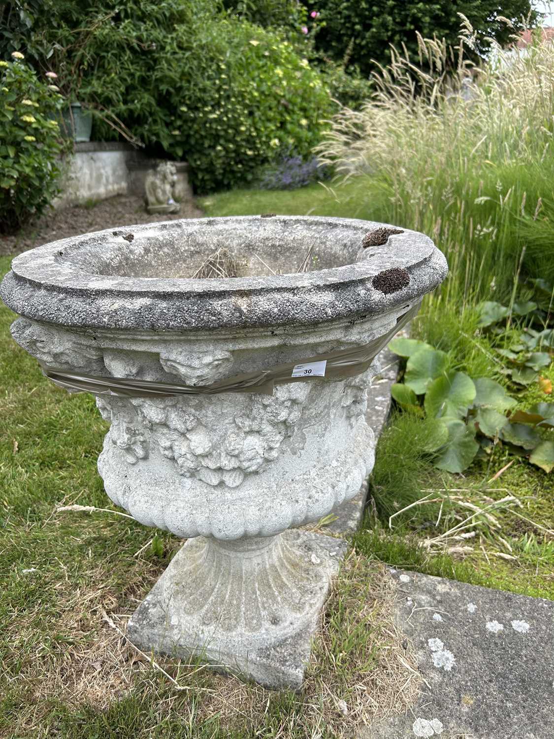 A pair of composite garden urns, height approx 65cm