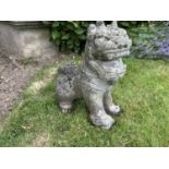 Composite garden statue formed as a dragon, height approx 45cm together with a composite garden