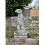 Composite garden statue formed as an eagle, height approx 80cm, width approx 70cm