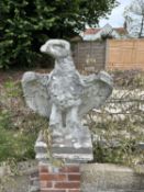 Composite garden statue formed as an eagle, height approx 80cm, width approx 70cm
