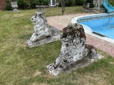 Pair of composite seated lions, height approx 80cm, overall length approx 110cm