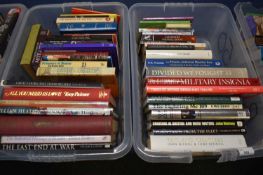 Two boxes of various hardback and softback books including military interest, historic interest,