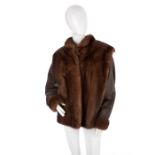 A mink jacket and a shearling coat
