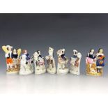 A group of seven 19th Century Staffordshire flatback figure groups, to include four figures of