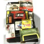 A collection of model and toy cars and vehicles, makers include Burago, Corgi, Solido, Polinstil
