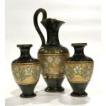 A collection of Royal Doulton chine gilt stoneware, to include a pair of baluster form vases and a