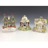 Three 19th Century pastille burners, to include a Leeds Pottery creamware Regency cottage with