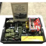 A collection of die-cast Dinky military models, some boxed, together with a Crescent Toy Howitzer (