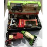 A collection of die-cast and plastic model agricultural tractors and implements, to include a Ros