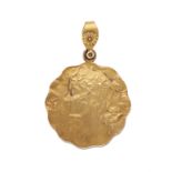 An Art Nouveau 15ct gold portrait locket pendant