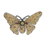 An 18ct gold orange sapphire and yellow gem butterfly brooch