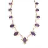 An Arts & Crafts gold amethyst and pearl necklace