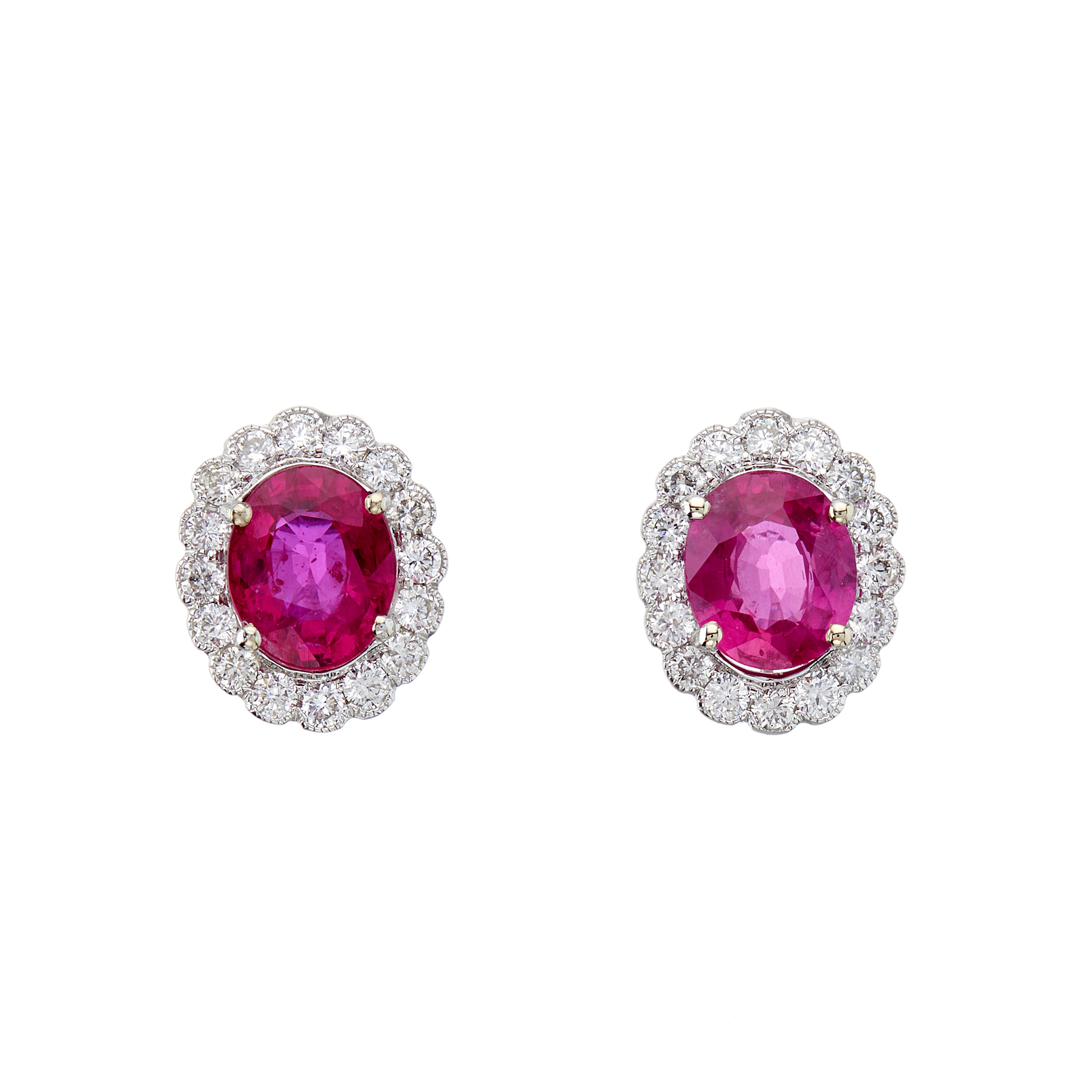 A pair of 18ct gold ruby and diamond cluster stud earrings